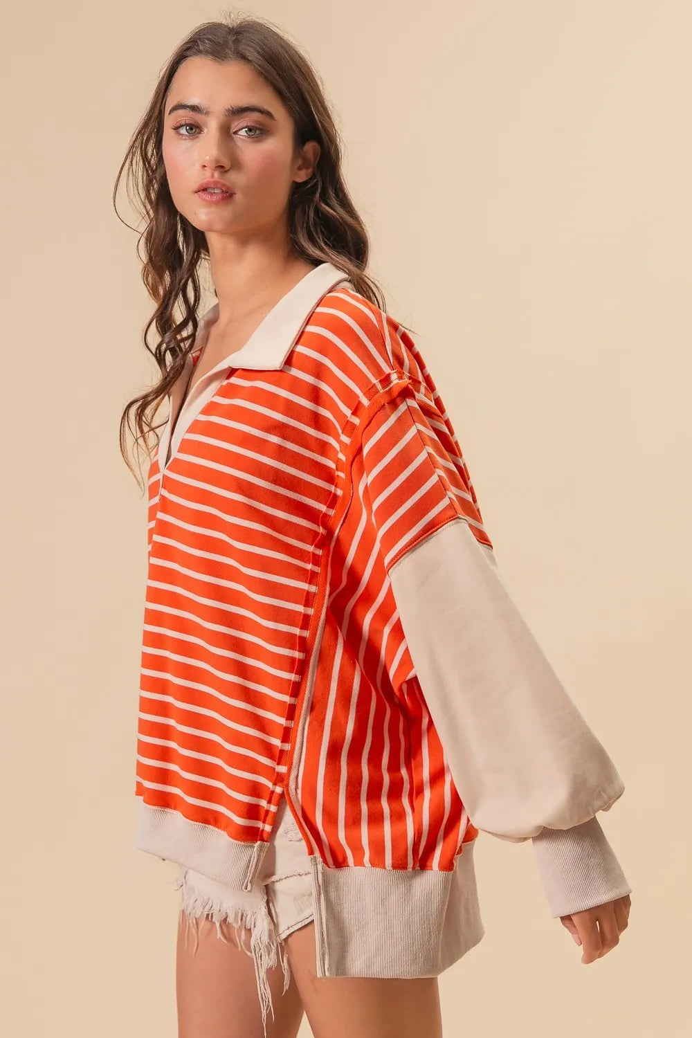 BiBi Stripe Knit Loose Fit Top With Cut Edge Detail in Orange