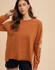 Annie Wear Embroidered Long Sleeve French Terry Top