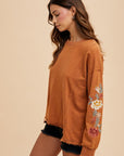 Annie Wear Embroidered Long Sleeve French Terry Top