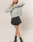 HYFVE Distressed Cable-Knit Round Neck Long Sleeve Sweater