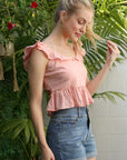 Lilou Sleeveless Ruffled Top with Flare