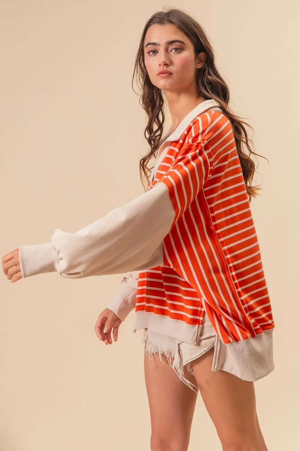 BiBi Stripe Knit Loose Fit Top With Cut Edge Detail in Orange