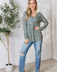 Heimish Full Size Floral Half Button Long Sleeve Blouse