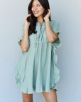 Ninexis Ruffle Hem Dress with Drawstring Waistband in Light Sage - Online Only