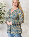 Heimish Full Size Floral Half Button Long Sleeve Blouse