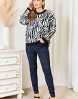 Heimish Full Size Zebra Print Sweater