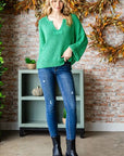 Veveret Notched Long Sleeve Sweater