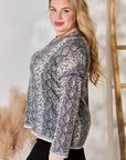 Hailey & Co Full Size Snakeskin V-Neck Long Sleeve Top