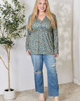 Heimish Full Size Floral Half Button Long Sleeve Blouse