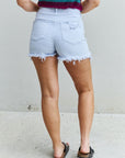 RISEN Katie High Waisted Distressed Shorts in Ice Blue - Online Only