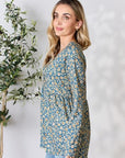 Heimish Full Size Floral Half Button Long Sleeve Blouse